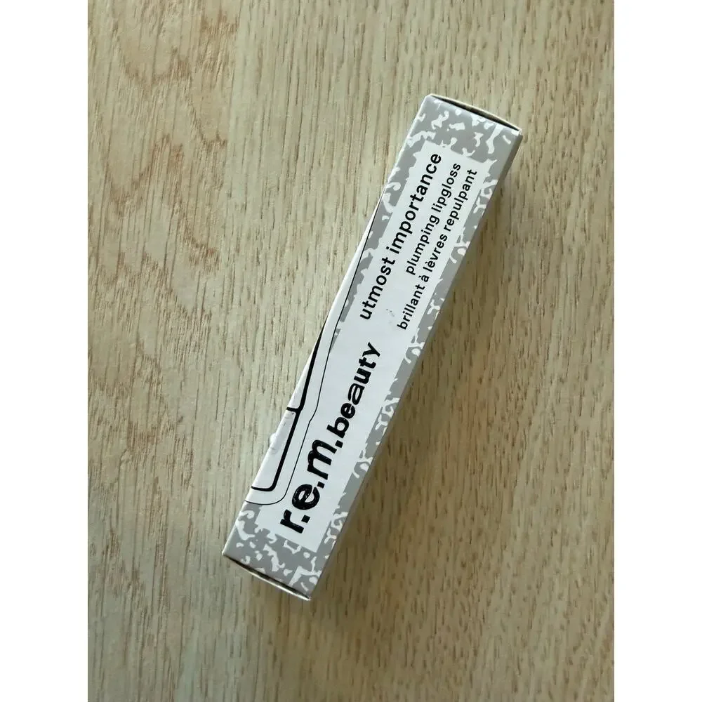 $23 New REM Beauty Upmost Importance Plumping Gloss - 15mL